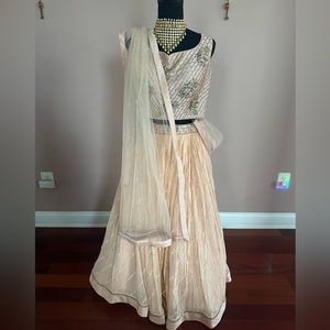 Designer Lehenga with 7 meter Flare paired with designer blouse and duoatta.